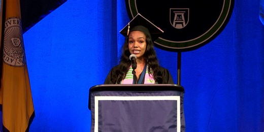 Augusta University graduating students walk across the stage