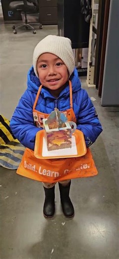 Reign makes cocoa mug at home depot workshop 12.6.25