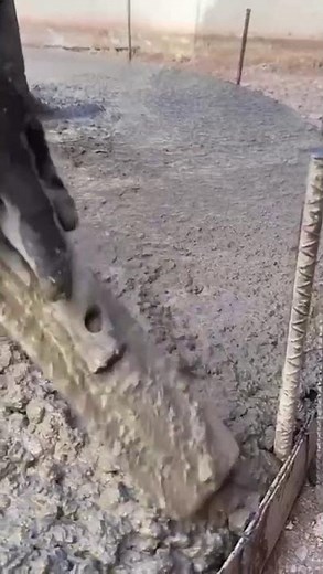 This is the process of leveling a cement mixture all the way to the edges