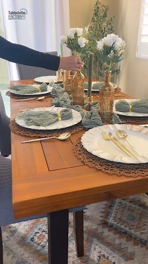 Boho Green & Gold Tablescape 😍 Perfect for dinner parties, bridal showers, engagement parties, weddings, and more! Items Featured: 🖤 Dusty Sage Green Cheesecloth Runner 🖤 Natural Placemats 🖤 White Scalloped Charger Plates 🖤 Dusty Sage Green Cheesecloth Napkins 🖤 Gold Napkin Rings 🖤 Gold Plastic Cutlery 🖤 Gold Candle Holders 🖤 Green Ribbed Taper Candles 🖤 Amber Wine Bottle Vases 🖤 Silk Rose Bouquets Shop more Boho inspired decor: https://bit.ly/3DnagPK #bohotabledecor #sagegreenwedding