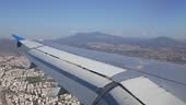 Beautiful aerial view seen through window of flying aeroplane. Real...
