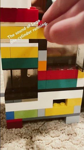 Running/revving Lego one cylinder vacuum engine with just the sound of the engine revving.