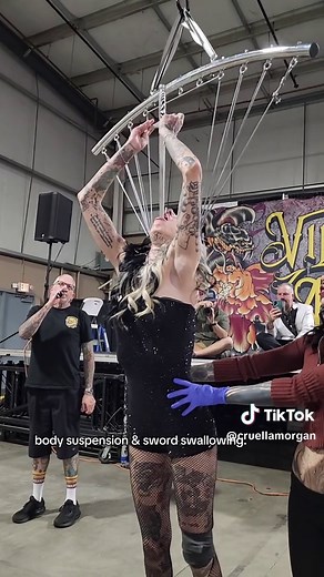 Unbelievable Sword Swallowing and Body Suspension by Cruella