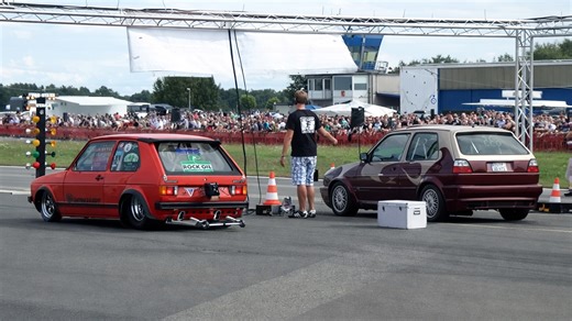 Which Volkswagen Golf wins this quarter mile race?