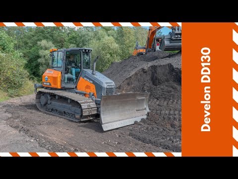 Brand new Develon DD130 bulldozer cutting a slope - Midweek Moments