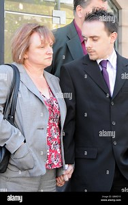 Matthew Pyke's mother, Kim Pyke and brother Adam Pyke listen to a statement being read outside court outside Nottingham Crown Court after David Heiss was found guilty of the murder of Matthew Pyke Stock Photo - Alamy