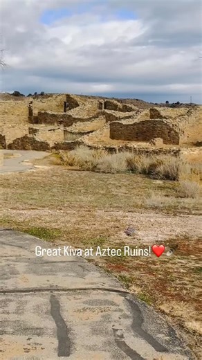 Dino Doug Crawford on Instagram: "The reconstructed Great Kiva at Aztec Ruins National Monument is a vast, circular space set slightly below ground level, its scale immediately signaling that this was not a household structure but a communal one. Thick masonry walls define the perimeter, while massive timber beams—ponderosa pine hauled from distant mountain ranges—span the interior, supporting a roof that once enclosed ceremony, decision-making, and shared identity. Inside, the architectural det