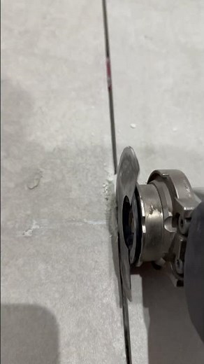 In my opinion, done carefully this is the best way to remove excess tile adhesive.