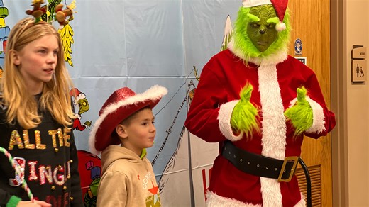 Lights, Grinch and family at Bucyrus Candlelight Christmas