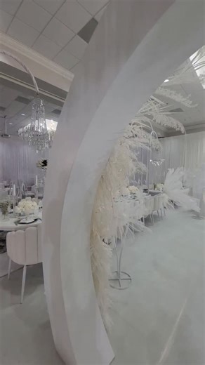 Prepare to be mesmerized! 🤩 This wedding decor is pure magic with its stunning crystal light and flower ceiling, and an elegant all-white custom entryway. We're all about creating those 'wow' moments! #WeddingInspiration #EventDesign #WeddingGoals #FloralInstallation #LuxuryEvents #whitewedding | Lady Victoria Design