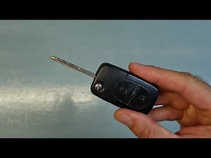 How to open a Volkswagen, Seat, Skoda, and Audi car key and change a car battery.