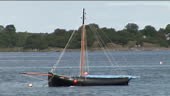 MS, Currach boat anchored in lake, Galway County, Ireland