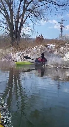 Winter Kayaking Adventure in Snowy Conditions