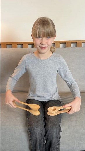 Playing a Drum Beat on Musical Spoons