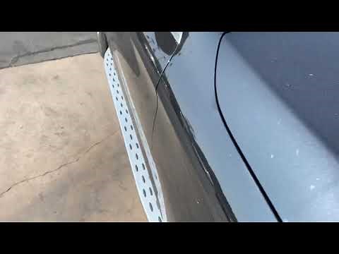 Where is the auxiliary battery located in the Mercedes GLC?