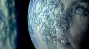 clip-1078902431-face-portrait-amazed-woman-astronaut-helmet-looking