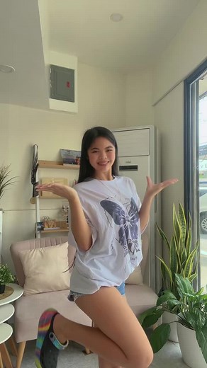 Charming Indoor Dance Routine with Butterfly Graphic