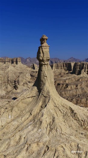 Princess of Hope, a natural rock formation along the Makran Coast, Balochistan, Pakistan. This rock formation resembled with a crowned and skirted woman gazing over the horizons of Makran, and this rock was named Princess of Hope by Angelina Jolie during her visit to Pakistan in 2002. | Tehsin Razi