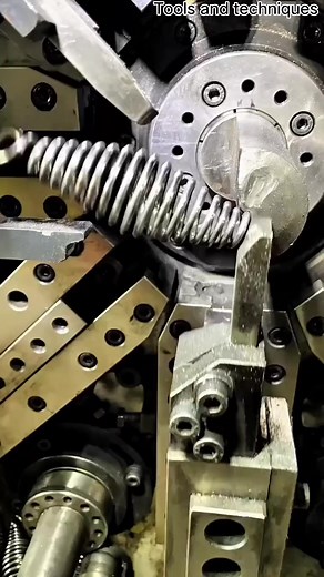 A barrel compression spring. These springs are wider in the center than at the ends, giving them a barrel shape. #manufacturing #machine #spring #metalfabrication #construction #ironwork #steel #barrel #reelsfypシ #facebookreel #reelsvideo #factory #factorywork | Tools & Technique