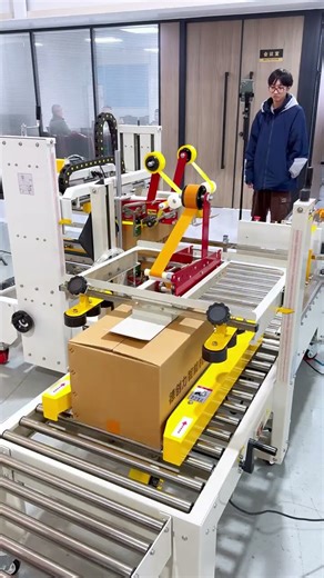 The factory manager inspected the workshop and stood in front of this new machine for a full..