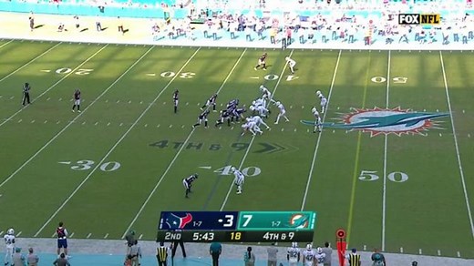 Kevin Pierre-Louis fights through scrum for fumble recovery