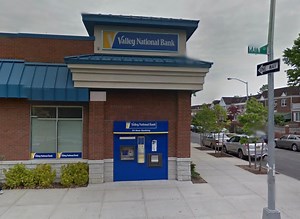 Car Crashes Into Flushing Bank, FDNY Says