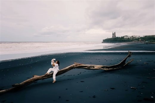 Native Visual | Bali Wedding Photographer — Documentary Style on Instagram: "Feeling the wind, hearing the gentle waves, this kind of love that only grows deeper with time. Lita, Aji and their sweetheart: Tatiana. @dwinarulitaaa @lukmanfadjrii #NVBALI"