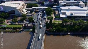 Cars And Articulated Bus Driving Across Victoria Bridge Over Brisbane River In Brisbane, Queensland, Australia. - aerial drone shot