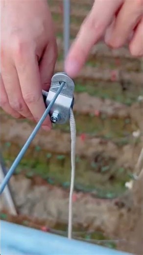 Made a pair of tongs by bending two old forks and connecting them