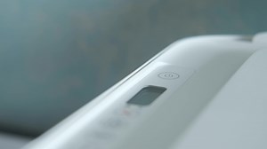 Download Hand pressing button on printer close up for free