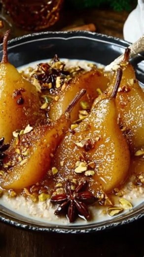Handmake Recipes on Instagram: "🍐✨ Spiced Poached Pears with Creamy Oat Base | 💪 Protein 12 g Elegant, warmly spiced pears gently poached until tender and served over a creamy oat base. Sweet, aromatic, and perfect for a cozy dessert or elevated brunch treat. 📝 Ingredients: 🍐🌰 ✦ 4 ripe but firm pears peeled 🍐 ✦ 3 cups water 💧 ✦ ½ cup brown sugar 🍯 ✦ 1 cinnamon stick 🌿 ✦ 2 star anise ⭐ ✦ 3 cloves 🌿 ✦ 1 tsp vanilla extract 🍦 ✦ 1 cup rolled oats 🥣 ✦ 2 cups milk 🥛 ✦ 2 tbsp chopped pista