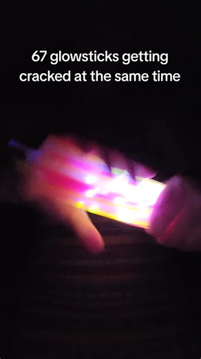 asmr of 67 glowsticks getting cracked at the same time #fyp #asmr #cracked #glowsticks #viral