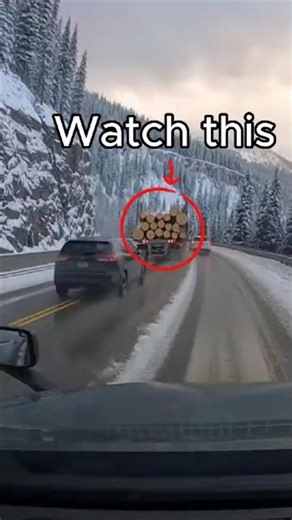 Log Truck Loses Control on Icy Mountain Highway, Spilling Logs