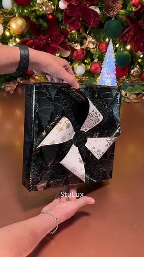 380K views · 3.9K reactions | ✨Two sides, one stunning result ✨ -  COMMENT ‘SLOW’ if you need a slow tutorial for this wrapping technique  Images Captured and Edited by @stulux_  Music in this video is licensed through Epidemic Sound . #christmas2025 #christmascountdown #ruspepa #giftwrapping #194stulux | StuLux Gift Wrapping | Facebook