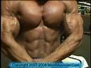 Bodybuilder Armon Adibi poses, trains pecs