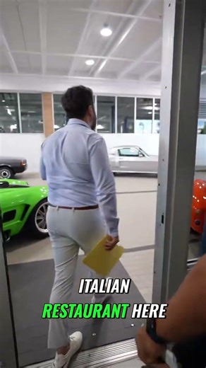 Ferrari Race car driver gives a private tour of his luxury car delearship