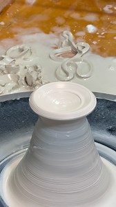 Hear John is throwing the lid to the flying saucer covered jar. He’s throwing the lid off the hump because it’s so much easier to handle a larger amount of clay than a tiny amount of clay. He’s also making the lid slightly larger than the galley of the pot so that it can be fit later and made to be perfect. . . . To be notified of future sales, please visit: https://www.tiltonpottery.com/mailing-list In Instagram, just go to the link in the bio and click on the Mailing List tab. #ceramic #potter