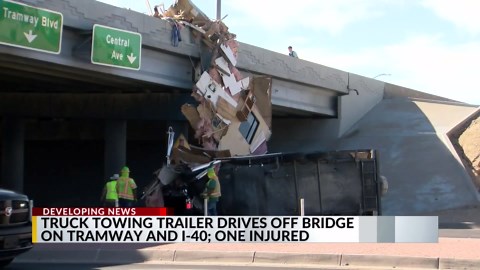 Vehicle goes off I-40 bridge onto Tramway in Albuquerque