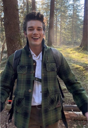 Climbing a Mountain in Traditional Austrian Lederhosen