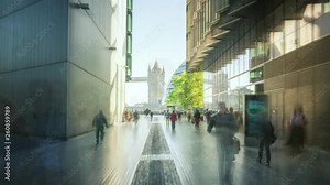 hyper lapse of modern buildings and Tower Bridge, London, UK