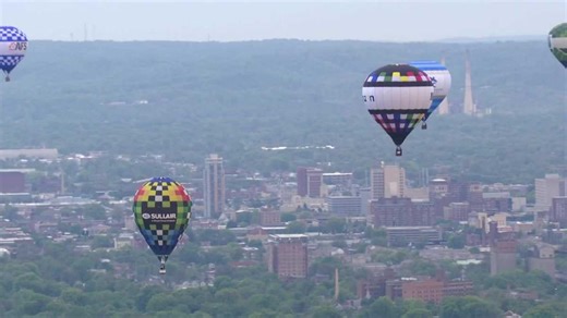 Hot air balloons fill the sky for the Great Balloon Rush-Hour Race
