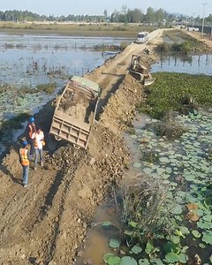 2.1M views · 10K reactions | Dump Truck Stuck!!! Operating Building Long Road Cut The Water, By Bulldozer Old Version Push Soil Clear Water | Bulldozer Cambodia | Facebook