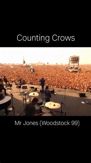 FacesOfRock1 on Instagram: "Counting Crows - Mr. Jones (Woodstock ‘99). This song is a commentary on fame. With the line, "When everybody loves me, I will never be lonely," lead signer Adam Duritz is stating - with more than a touch of sarcasm - that fame will make everything better ("never be lonely" is repeated to drive home the message: This guy is delusional). When it became the first hit for the band, Duritz was suddenly recognized all over America, which he found discomfiting. The newfound