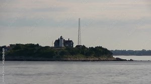Passing nobska light house in woods hole Falmouth Cape Cod from ferry boat in early morning on way to Martha's Vineyard Stock Video