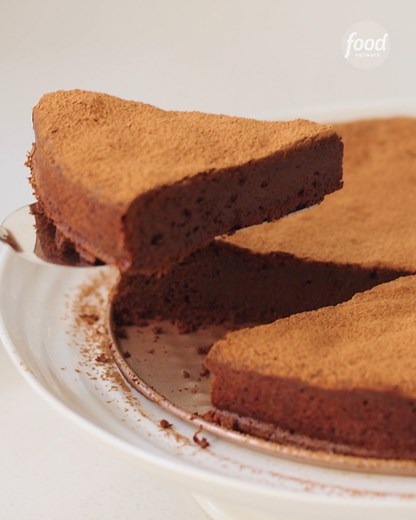 842 reactions · 178 shares | Dark chocolate lovers, rejoice over this Ultimate Flourless Chocolate Cake served with whipped cream  Get the recipe: https://foodtv.com/3QMzieS | Food Network | Facebook