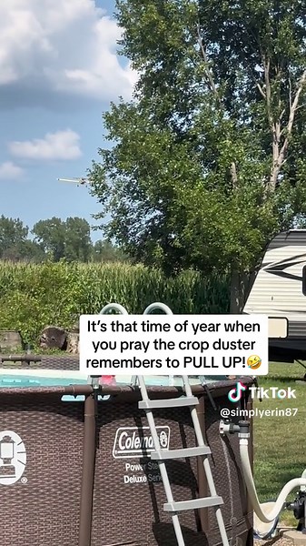 Indiana Farm Crop Duster Flying Over Corn Fields