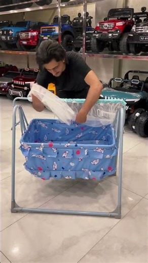 baby swing is a soothing, motorized seat designed to gently rock or sway an infant