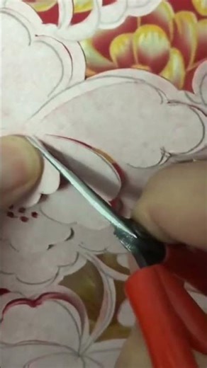 the process of cutting paper using scissors into a nice shape#creative