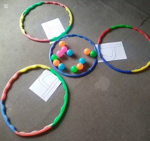 P.G. learners explored the number 4 through the play-way method by arranging balls, which enabled them to recognize and understand the concept of the number. #engaged #innovative #confident #nistschool | NIST School