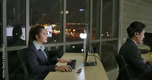 Customer Service female and male as a representative wearing headset earphones working in Call Center Office to pick up phone call and communicate to assist and advise customer.